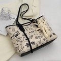 Off-white graffiti tote bag with black artistic patterns and a cute bunny pendant - With Ornament / Black