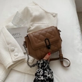 Brown quilted chain shoulder bag for women with black metal clasp and compact design - Brown