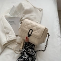 Creamy white quilted crossbody bag with stylish black buckle and metal chain strap - Beige
