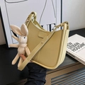 Fashionable light yellow PU leather underarm bag with a cute knit rabbit charm - With Pendant / Yellow