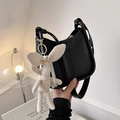 Minimalist black leather underarm bag with pleated details and white bunny charm accessory - With Pendant / Black