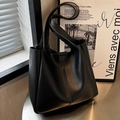 Minimalist black tote bag in matte finish with vertical stitching and long shoulder straps - Black