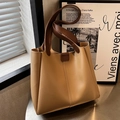 Minimalist khaki tote bag with dark brown handles and matte synthetic leather finish - Khaki