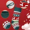 Close-up of knitted Christmas stocking with reindeer patterns and festive holiday details - Christmas Socks