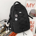 Zaino in nylon nero con lacci elastici, toppe alla moda e ciondolo in peluche a scacchi - Con Ciondolo / Nero