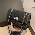 Quilted black leather shoulder bag with silver chain strap and metal swivel lock - Universal Specification / Black