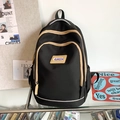 Minimalist black casual backpack with contrasting beige zippers and front zipper pocket - Black without Pendant