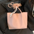 Pink lychee grain leather tote bag with decorative checkered scarf and gold text - Pink