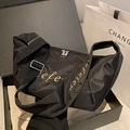 Black Oxford cloth dumpling crossbody bag with gold embroidery in a premium gift box - Black
