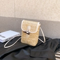 Vertical straw woven crossbody bag with white leather trim and toggle closure detail - White