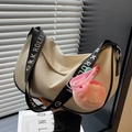 Off-white crescent saddle bag with wide branded shoulder strap and peach charm - With Charm / Off-white