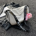Cream white saddle bag with wide logo strap and pink peach charm charm decoration - No Pendant / Black
