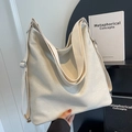 Vielseitige große Canvas-Einkaufstasche in Beige mit verstellbarem Gurt für Damen im Minimal-Stil - Cremeweiß