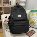 Zwarte schoolrugzak met smiley-patch en meerdere compartimenten voor studenten - Zwart Met Hanger