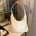 Ivory hobo shoulder bag with litchi texture and wide strap in minimalist style - Plaster