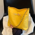 Bright yellow Oxford fabric shoulder bag with Lucky embroidery and metal chain strap - Yellow
