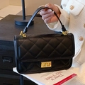 Classic black quilted shoulder bag with gold hardware and elegant metal twist lock - Black