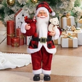 Detailed view of 18-inch Santa Claus figurine holding a teddy bear and burlap gift bag - Red/Black Plaid