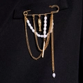 Golden paperclip brooch featuring white pearls and a delicate fish pendant detail - Irregular Pearl Fish Pendant Style (KC Gold 5572)