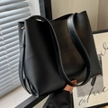 Minimalist large black matte leather tote bag with adjustable shoulder strap details - Black