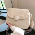 Beige faux leather crossbody bag with ethnic woven wide strap and golden hardware - White