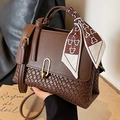 Dark brown hand-woven leather handbag with golden buckle and decorative silk scarf - Brown