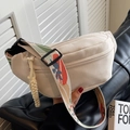 Minimalist cream canvas crossbody chest bag with colorful patterned wide strap for women - Off-white