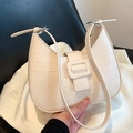 White crescent underarm bag with crocodile pattern and square buckle detail - White