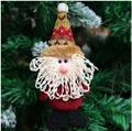 Décoration de Noël tricotée en forme de Père Noël avec bonnet rouge et barbe blanche - Style Père Noël