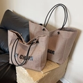 Oatmeal woven canvas tote bag set with black circular handles and minimalist lettering - Small / Khaki