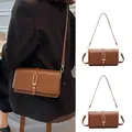 Vintage brown crossbody bag with matte faux leather and golden buckle closure - Brown