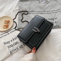 Minimalist black square crossbody bag with silver H-buckle and elegant chain strap - Black