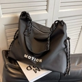 Borsa tote in nylon nero con stampa MOTION e manici in corda intrecciata - Nero