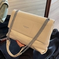 Creamy white quilted crossbody bag with silver chain strap and pebbled leather texture - Off White