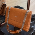Caramel quilted leather chain bag with elegant silver logo and mirror reflection - Brown