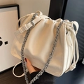 Chic beige pleated bucket bag with silver metal chain strap and sleek leather handle - Off White