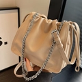 Chic beige pleated bucket bag with silver chain strap and adjustable leather shoulder strap - Apricot