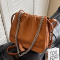 Chic brown ruched bucket bag with silver chain strap and matte synthetic leather finish - Caramel color