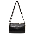 Classic black Boston pillow bag with woven wide strap and golden hardware accents - Black