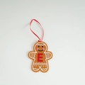 Gingerbread man felt ornament with red letter E and white frosting details on white background - Letter E(ML-O1455/E)