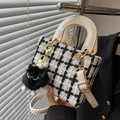 Mini checkered tweed handbag with creamy white straps and a cute plush monster charm - White