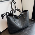 Black woven leather tote bag with gold logo and large capacity for daily commute - Black