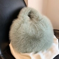 Elegante bolso de piel sintética verde pálido con textura esponjosa y silueta redonda - Verde