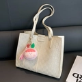 White large capacity tote bag with checkered texture and cute peach plush charm - Off-white