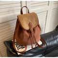 Detail of the suede and faux shearling backpack with vintage buckle and drawstring closure - Coffee