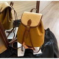 Detail of caramel suede and shearling backpack with brown leather strap and buckle - Brown