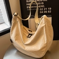 Chic beige nylon large capacity crossbody dumpling bag with wide adjustable strap - L / Off White