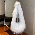 Fuzzy white faux fur shoulder bag with long shaggy fringe for a winter minimalist look - White