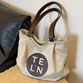 Grande borsa tote in tela con manici in pelle marrone e logo TELN in colore beige - Bianco Sporco