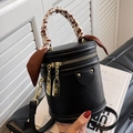 Black leather cylinder bucket bag with gold hardware and animal print silk scarf handle - Black